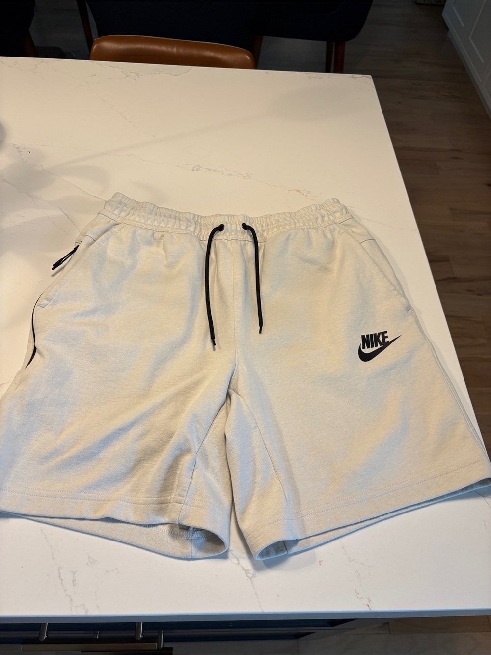 Nike Men's Off-White Athletic Shorts with Black Logo